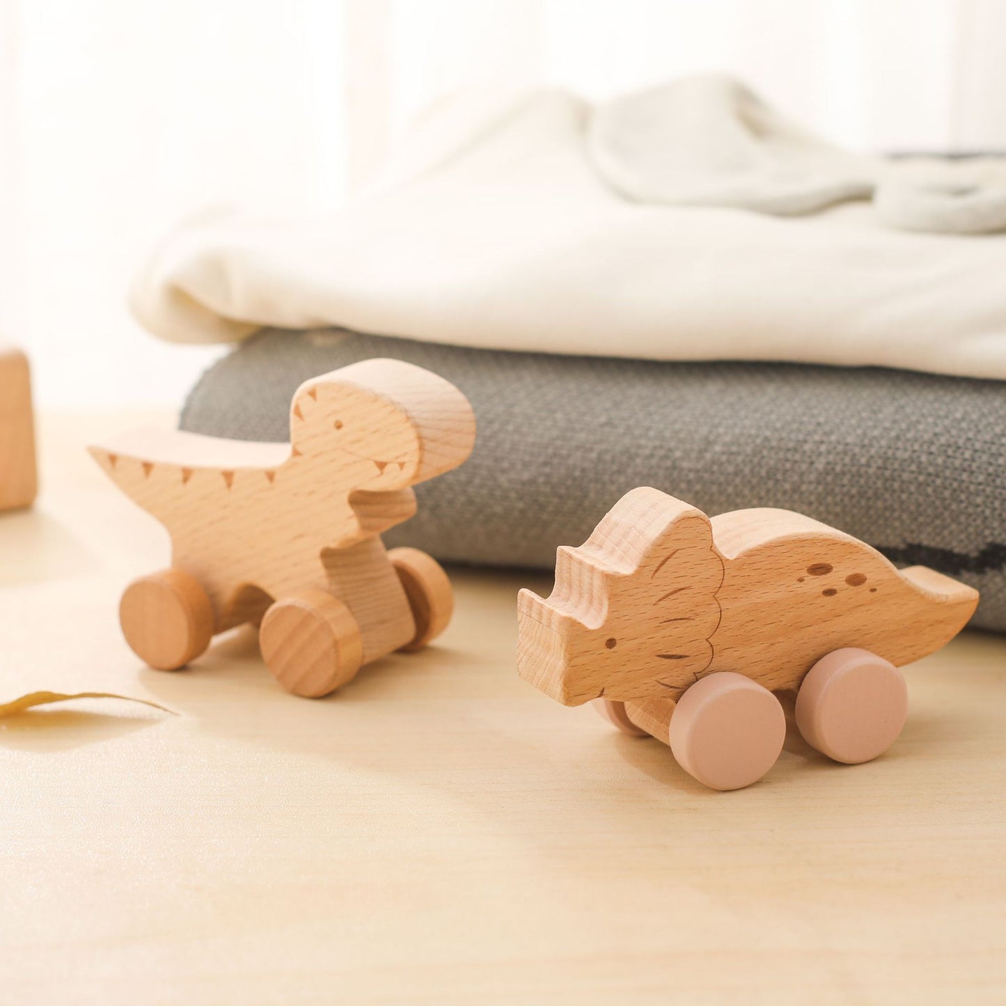 Wooden toy, rolling dinosaurs